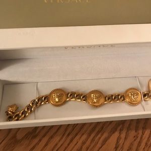 VERSACE gold coin bracelet w Medusa Head detail